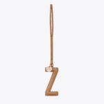 The Letter Charm in Camel